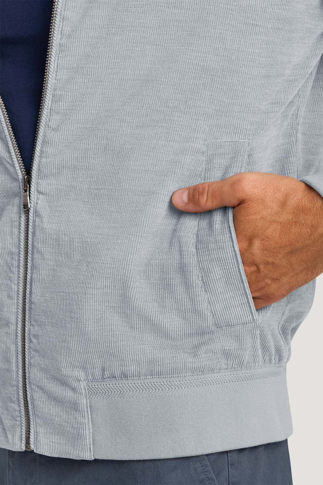 Stitching and rib trim detail on men’s bomber jacket